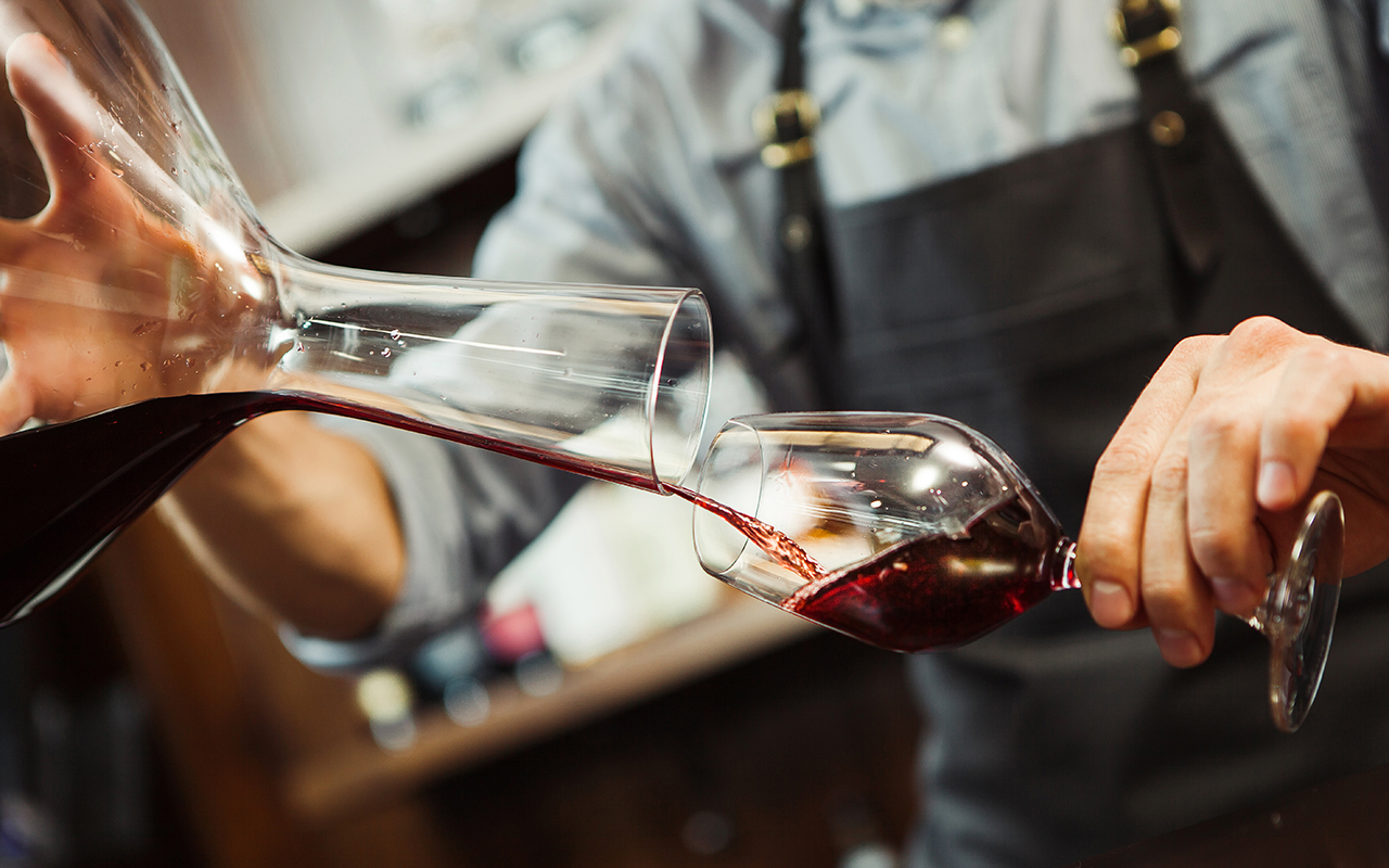 sommelier-pouring-wine-into-glass.jpg